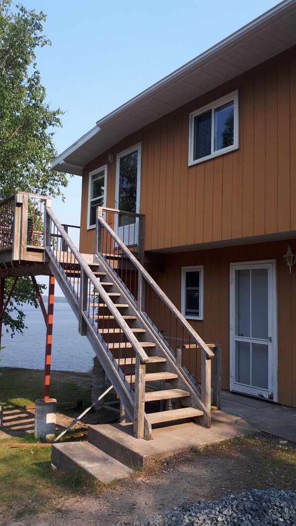 Door to 2 bedroom is to the right of the stairs. 3 bedroom suite is upstairs.