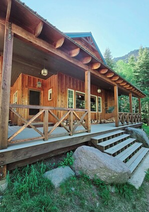 Front of Cabin with Large Porch and Forest Views