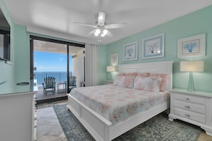 Primary Bedroom with King Size Bed and Private Access to Balcony overlooking the Gulf of Mexico