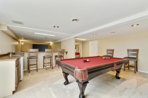 Get your game face on—this pool table is ready for some friendly matches.