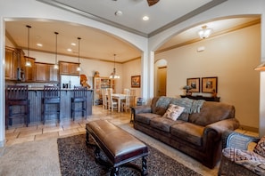 Living room, kitchen, and dining area