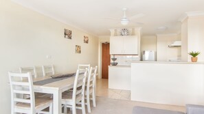 Kitchen with laundry and dining area