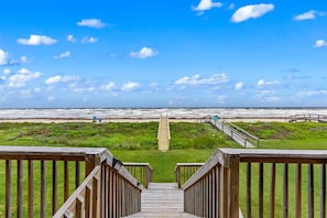 Just across the backyard you'll find the private beach walkover