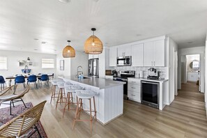 Enjoy beautiful beach views from your fully stocked kitchen.