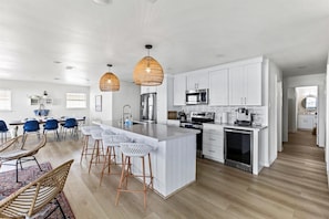 Enjoy beautiful beach views from your fully stocked kitchen.