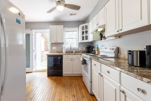 Cooking on vacation? The kitchen is stocked with appliances, large and small, to make a family meal.