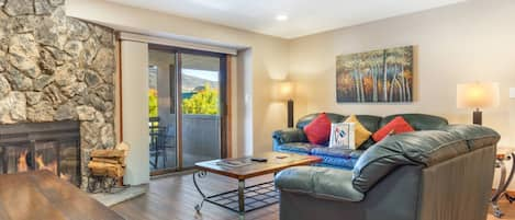 Living Room with sliding glass doors to access the private balcony.