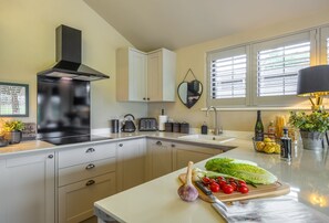 Ground floor: The stylish well-equipped kitchen