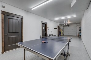 Guests of all ages love to play ping pong in our garage game room!