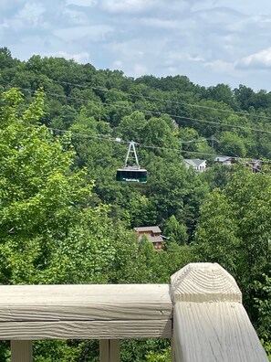 Wave to the passengers from the deck as the Ober Gatlinburg Tram passes by.  