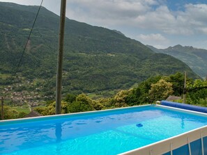 Water, Plant, Sky, Cloud, Water Resources, Property, Swimming Pool, Mountain, Blue, Green