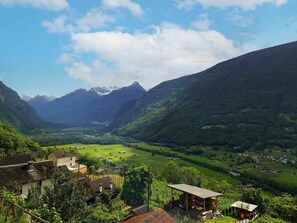 Sky, Mountain, Cloud, Plant, Natural Landscape, Natural Environment, Vegetation, Highland, Grass, Landscape