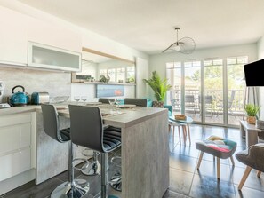 Furniture, Table, Cabinetry, Chair, Window, Interior Design, Countertop, Kitchen
