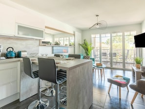 Furniture, Table, Cabinetry, Chair, Window, Interior Design, Countertop, Kitchen