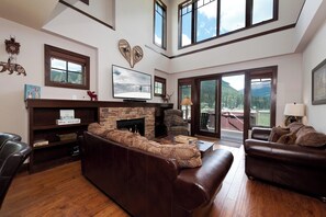 Main Living Space - TV, Gas Fireplace, Views and Deck Access