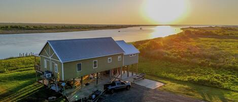 Beautiful sunrise over the Lower Hog Bayou lodge, come unwind.