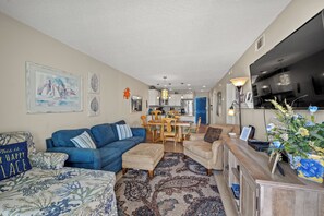 This comfy living room offers space for everyone to gather!