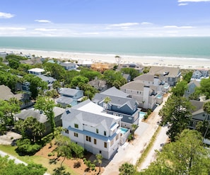 Drone shot: fifth row home with a short walk to the beach. No roads to cross. 