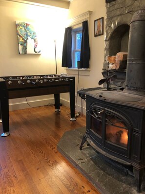 Wood burning stove fireplace and foosball