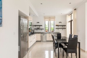 Full Kitchen and Dining Area