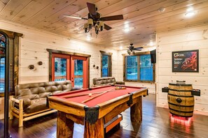 This well lit spacious game room is always a great option for bad weather days!