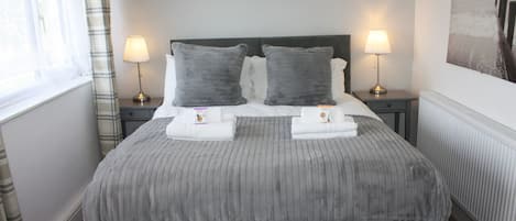 Luxurious King size bed (or 2x singles) provides a well earned nights rest