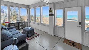 Porch with Storms & Screens Overlooking Lake Michigan w/ Queen Sleeper Sofa, Sonos Speaker, Shelving Unit with Kids Toys, Board Games, Books, More