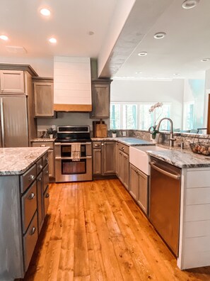 Kitchen -open floor plan to living room and dining room