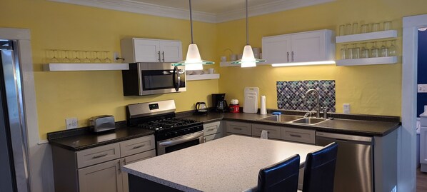 Fully equipped kitchen with counter seating
