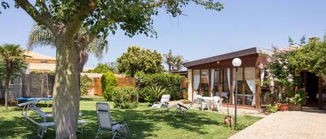 Villa has got a private garden with swimming pool, barbecue and outdoor kitchen 