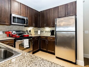 Large kitchen with stainless steel appliances