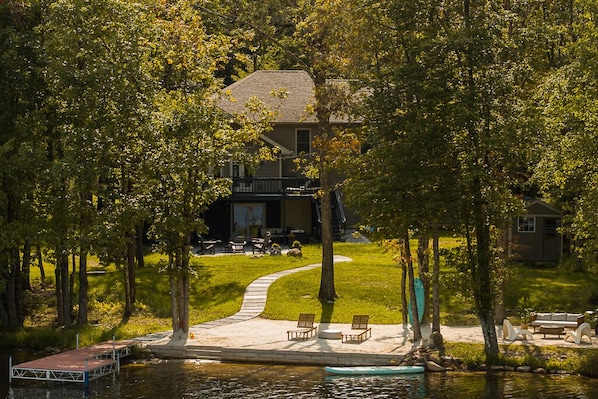 112' of private lake frontage with your very own dock, sand beach and patio 