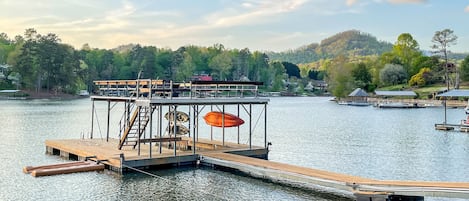 Enjoy the lake from the covered dock with boat slip and sun deck.