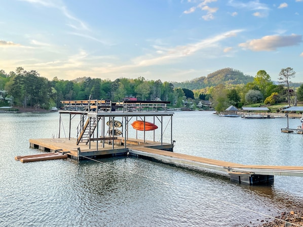 Enjoy the lake from the covered dock with boat slip and sun deck.