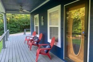 Lots of comfy seating on covered front porch