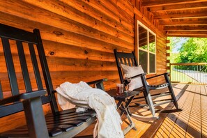 Front porch with swing chairs for your comfort and relaxation.