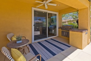 Covered Patio with convenient Natural gas BBQ.