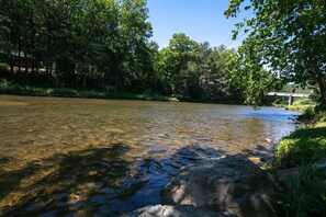 Access and enjoy Pine Creek from the yard.  