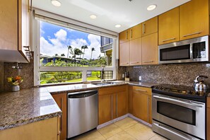 Stainless appliances, custom cabinets, granite counter tops