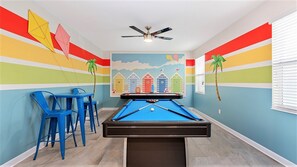 Game night ready: Pool table & comfy seating