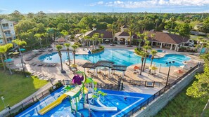 Resort-style pool, splash pad, and lush scenery—perfect for a fun-filled getaway!