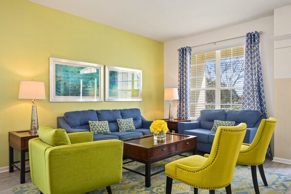 Bright and stylish living room with cozy seating, perfect for relaxing and unwinding.