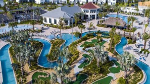 Sunshine, splash & staycations! This resort boasts a waterslide, pool & golf course for splish-splash fun & chill vibes.