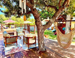 View of large deck and lounge areas.  Hammock is heavenly!