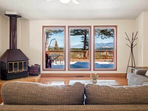 Warm up by the cozy stove and enjoy the view