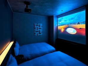 Twin rooms / all rooms are equipped with home projectors!