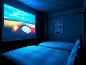 Twin rooms / all rooms are equipped with home projectors!