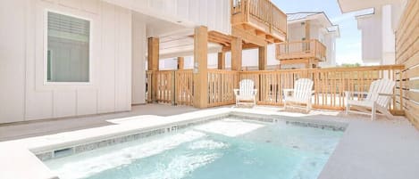 The private cocktail pool features a tanning shelf and has plenty of room for 10 or more adults to cool off after the beach