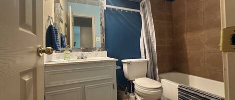 Hallway in bathroom serves bedrooms 2 and3
