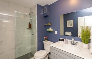 Expansive full-size bathroom provides unparalleled comfort and convenience during your stay.